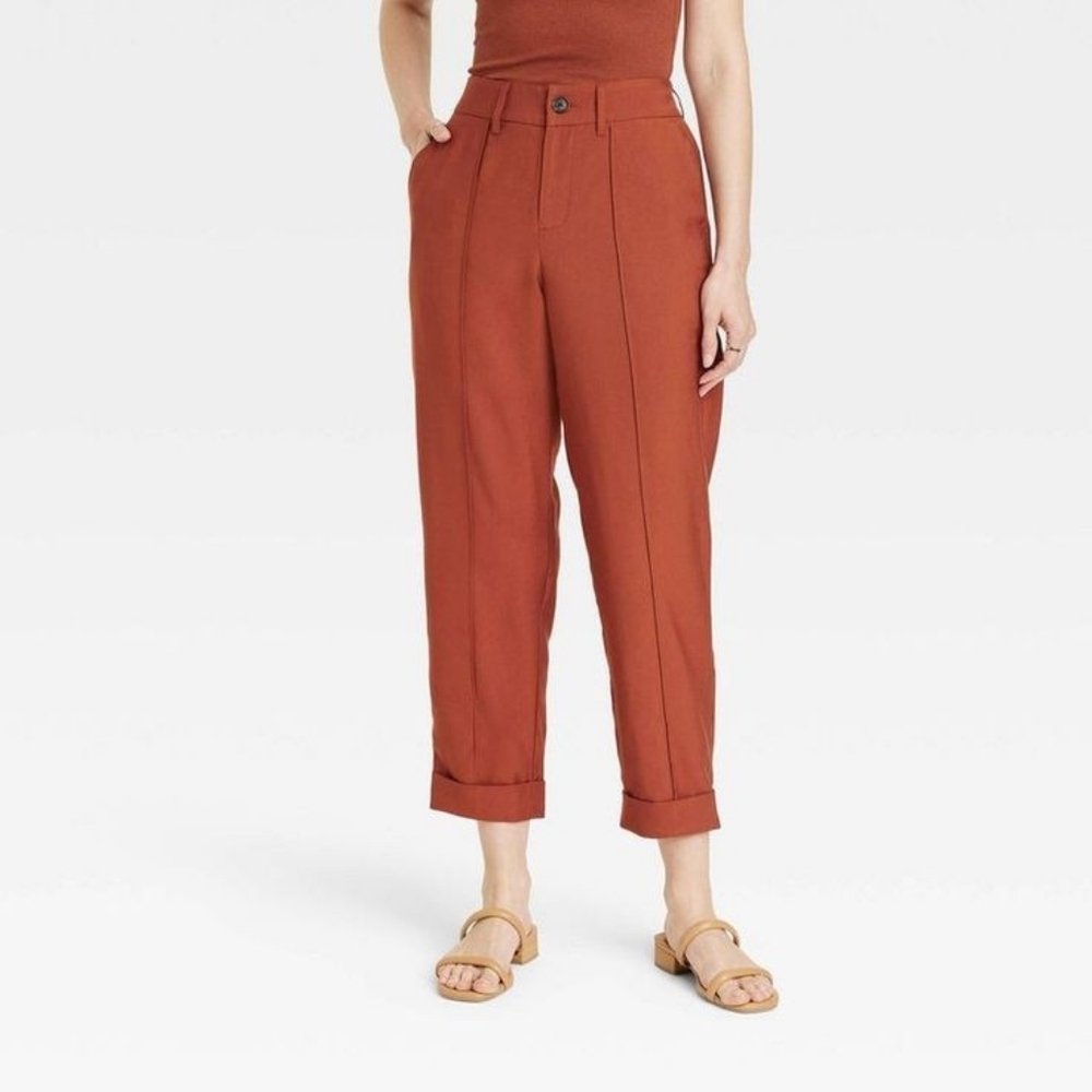 Rust colored high rise slim fit pintuck elastic waist ankle pants